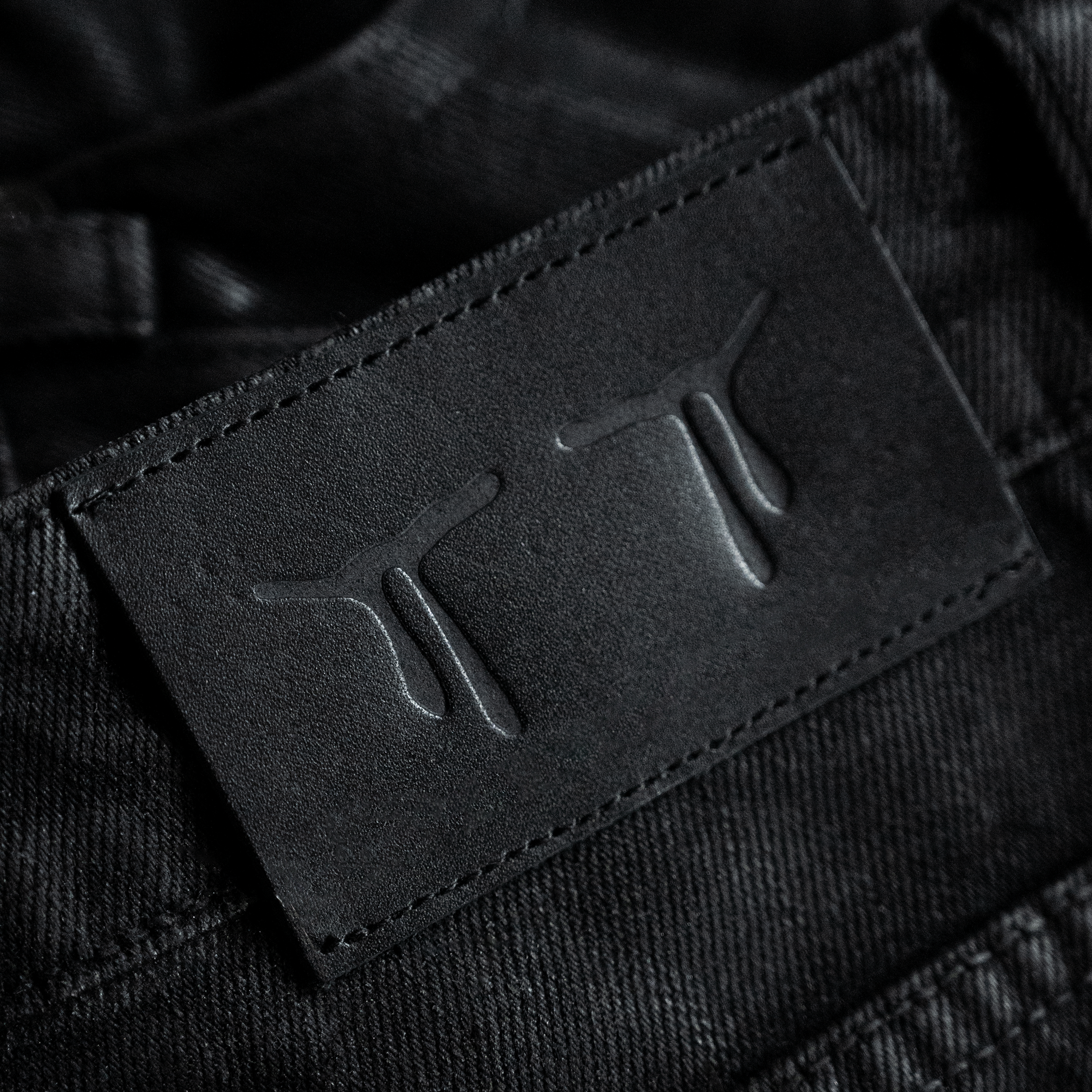 BACKSTAGE FLARED JEANS IN WAXED CHARCOAL DENIM