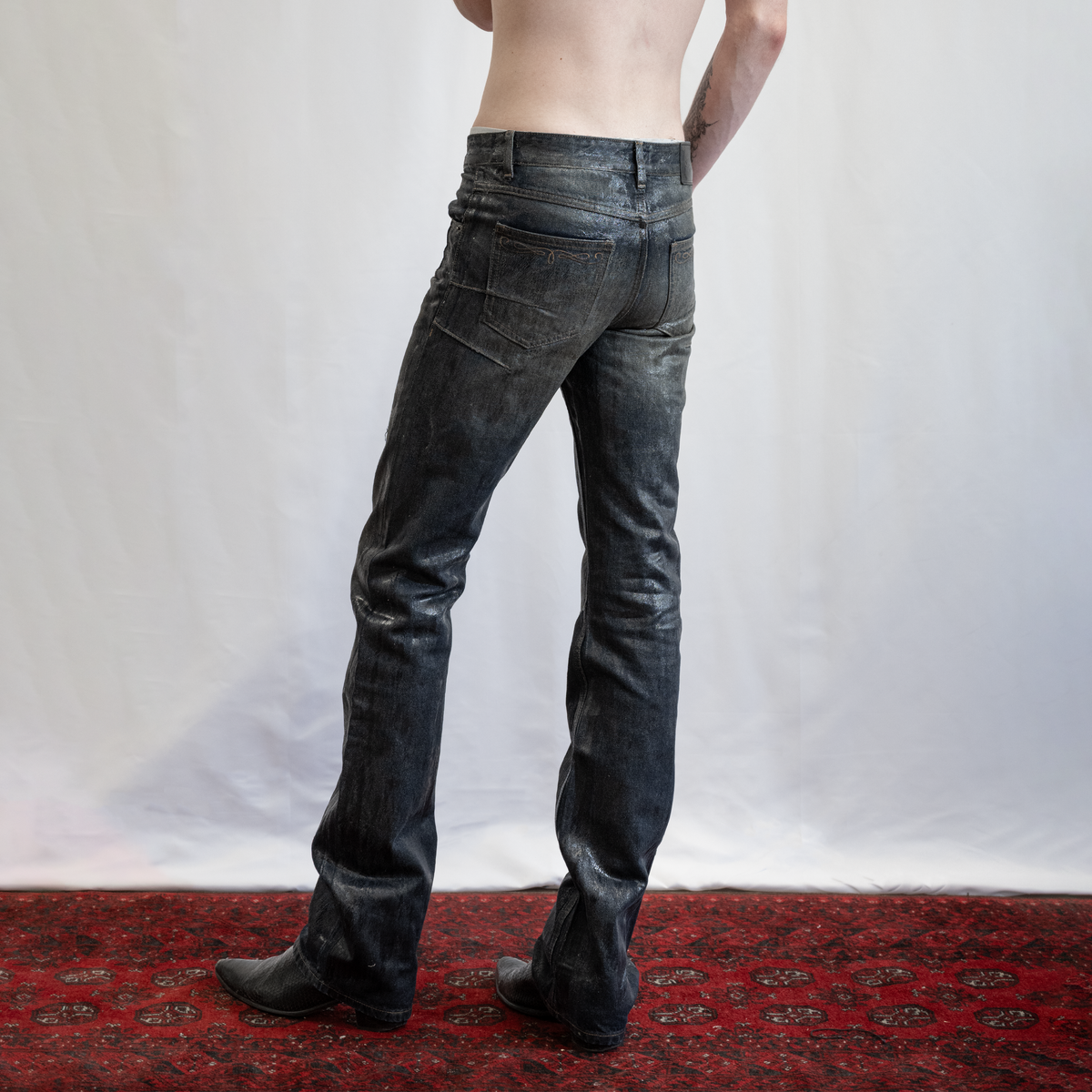 BOOTCUT JEANS IN RUST WASHED WAXED DENIM