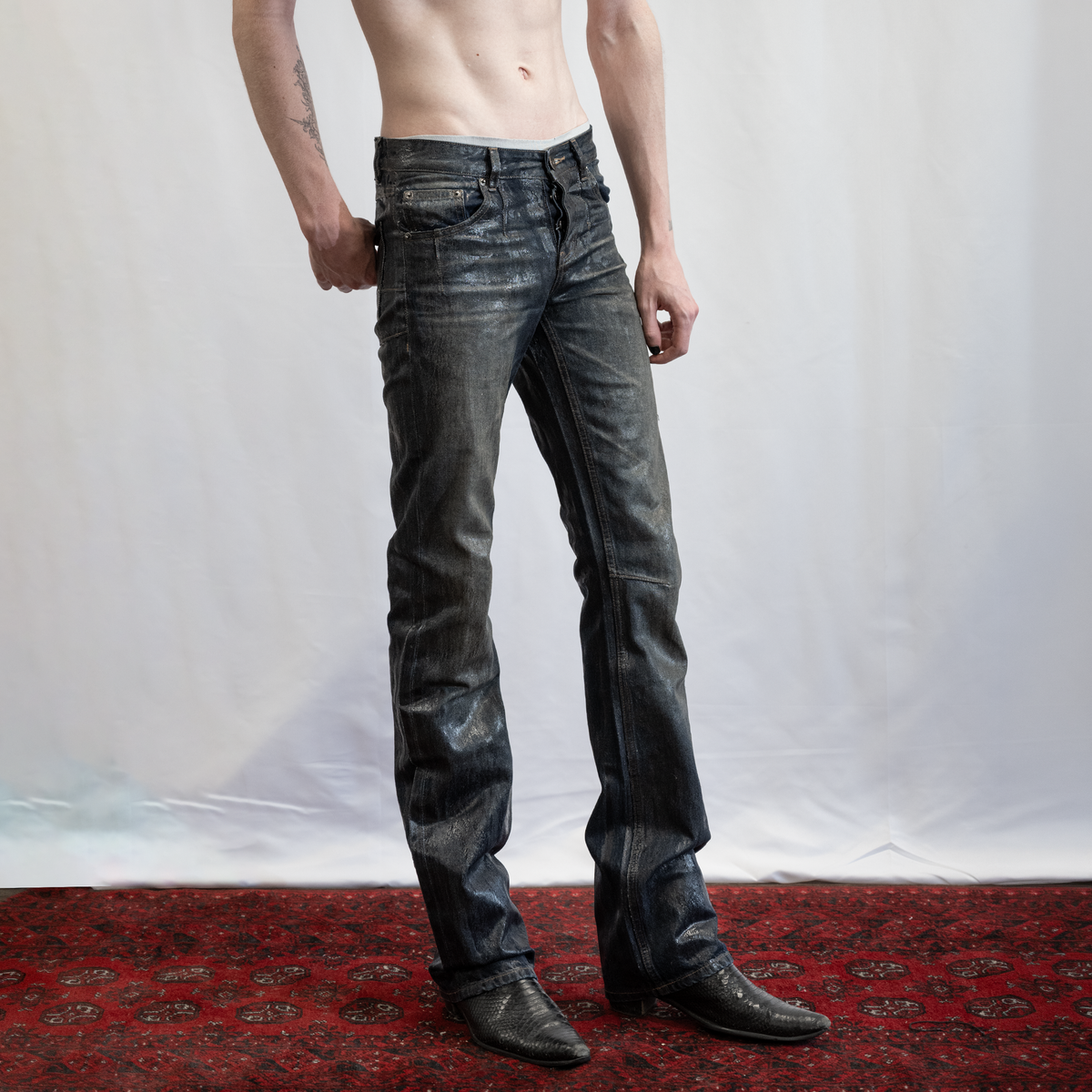BOOTCUT JEANS IN RUST WASHED WAXED DENIM