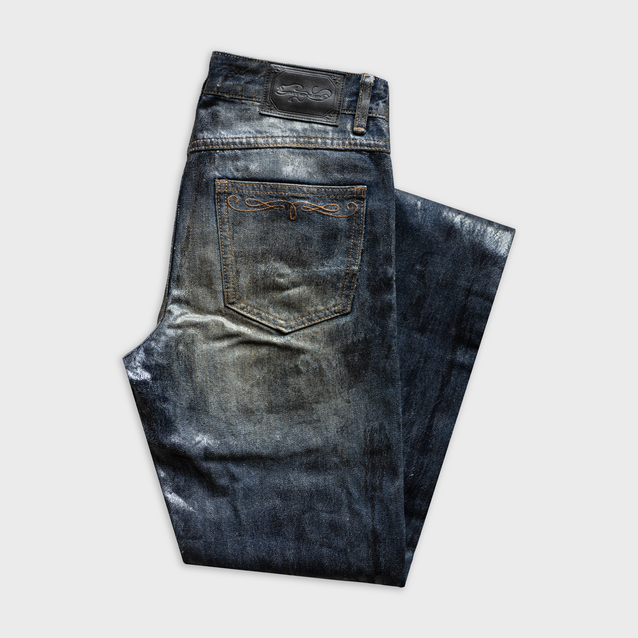 BOOTCUT JEANS IN RUST WASHED WAXED DENIM