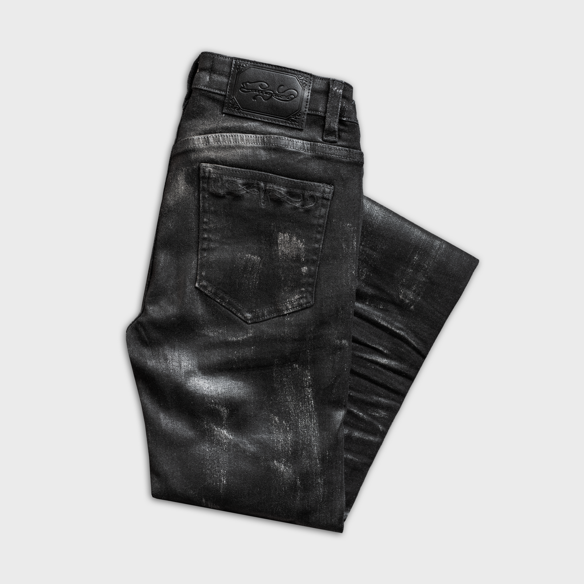 SKINNY FLARED JEANS IN WAXED BLACK DENIM